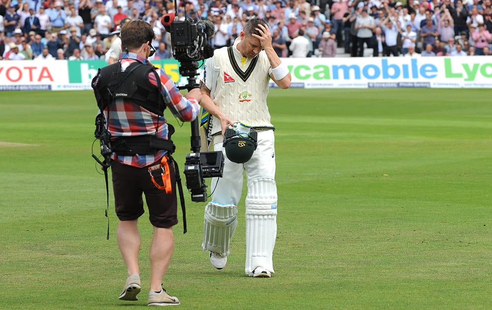 Australia’s Michael Clarke returns to the pavilion after being bowled by England’s Stuart Broad caught Alastair Cook for 10 runs during day one of the fourth Ashes Test cricket match, at Trent Bridge, Nottingham, England.