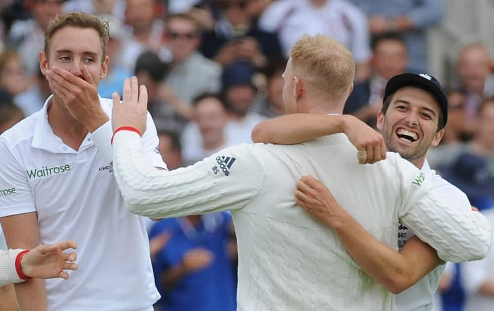 Englandís Ben Stokes is congratulated by Mark Wood and teammates after catching Australiaís Adam Voges, bowled by Englandís Stuart Broad for 1 run during day one of the fourth Ashes Test cricket match, at Trent Bridge, Nottingham, England.