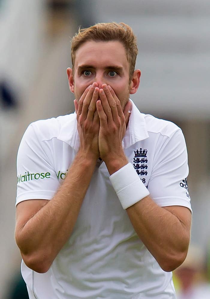 England's Stuart Broad reacts after a catch by teammate Ben Stokes dismissed Australia's Adam Voges for 1 on the first day of the fourth Ashes test cricket match between England and Australia at Trent Bridge cricket ground in Nottingham, England.