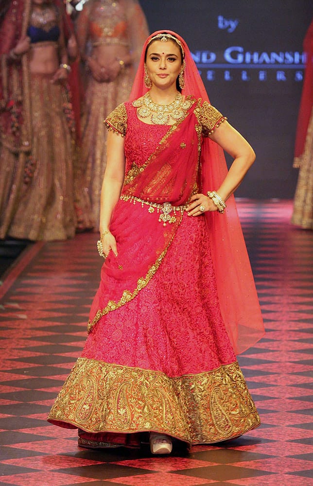 Bollywood actress Preity Zinta walks the ramp during India International Jewellery Week 2015, in Mumbai.