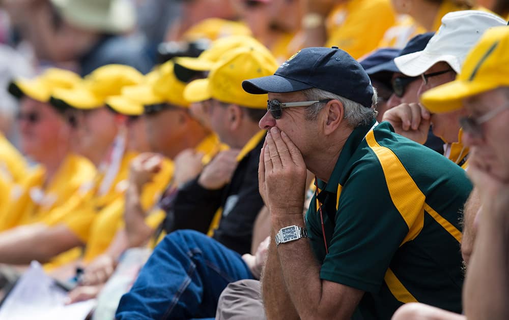 Australian fans sit in the stands as their team struggle during the first session on the first day of the fourth Ashes test cricket match between England and Australia at Trent Bridge cricket ground in Nottingham, England.