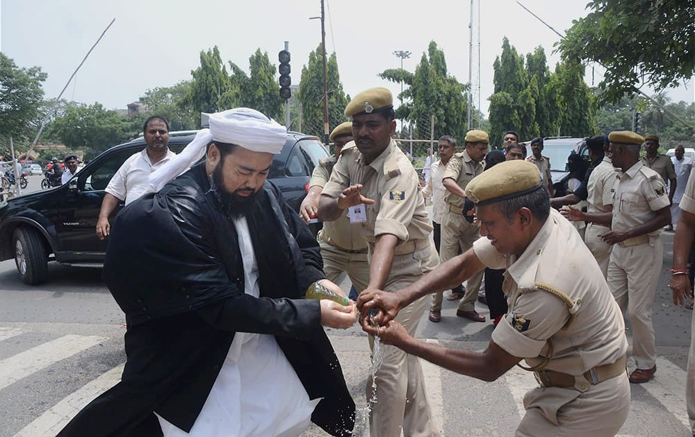 National Muslim Council leader Meraj Khalid Noor Madani try to suicide for demanding Muslim reservation in the main gate of Bihar Assembly in Patna.