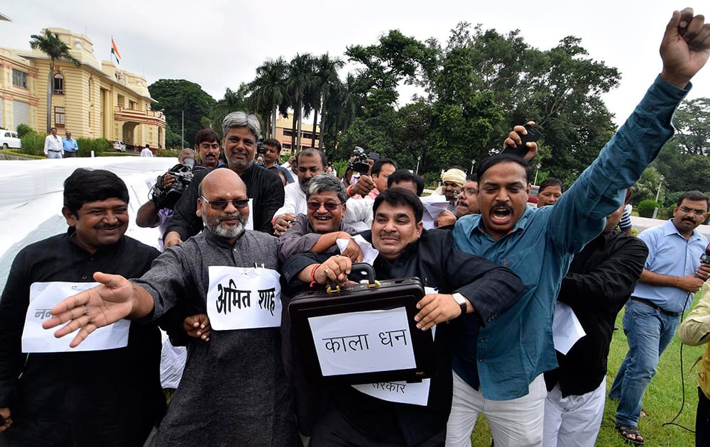 JD(U) legislators demonstration against NDA government on black money issue during ongoing monsoon session in Patna.