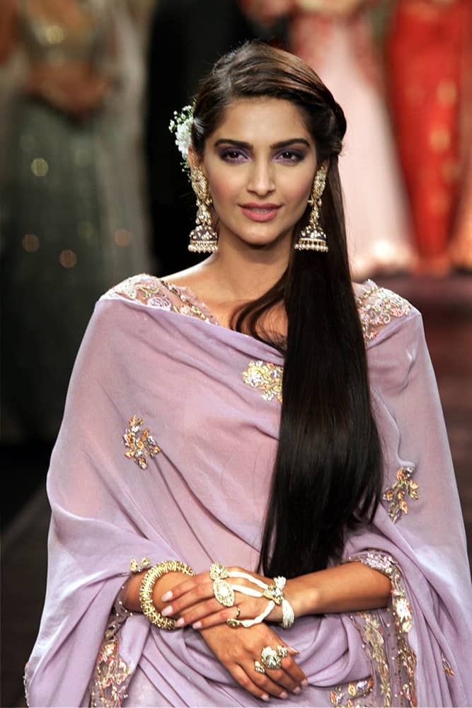 Bollywood Actress Sonam Kapoor,walks the ramp during the grand finale of India International Jewellery Week 2015.