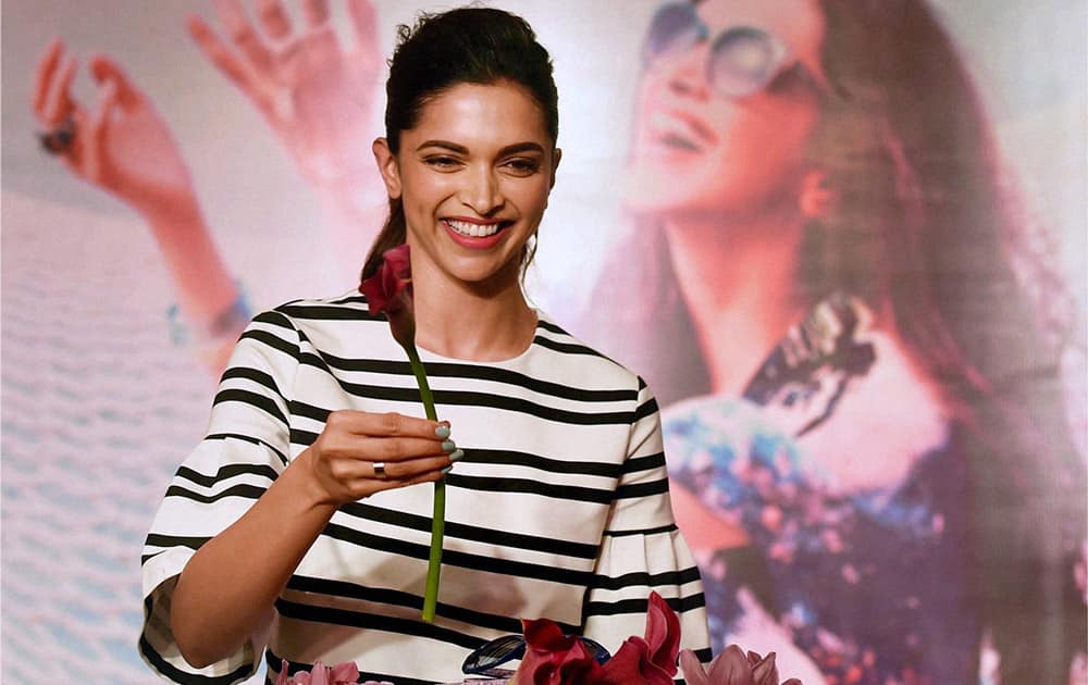 Deepika Padukone poses for media during the launch of Vogue eyewear in Mumbai.