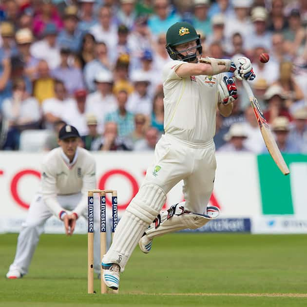 Australia's Chris Rogers hits a catch to Joe Root off the bowling of Mark Wood only to be recalled after the bowler is penalised for a no ball on the second day of the fourth Ashes test cricket match between England and Australia at Trent Bridge cricket ground in Nottingham, England.