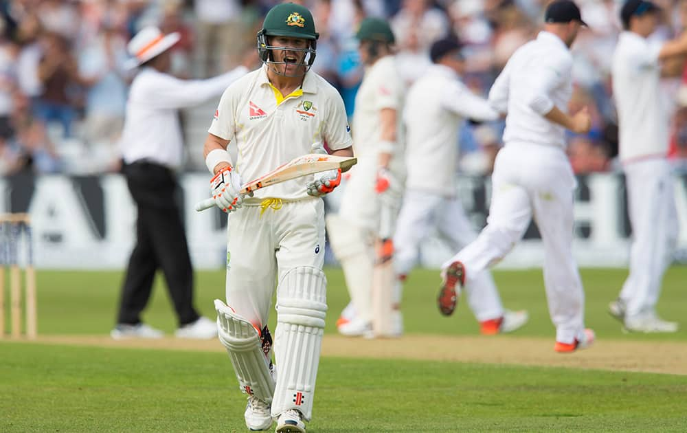 Australia's David Warner makes his way from the pitch after losing his wicket for 64, caught by England's Stuart Broad off the bowling of Ben Stokes on the second day of the fourth Ashes test cricket match between England and Australia at Trent Bridge cricket ground in Nottingham, England.