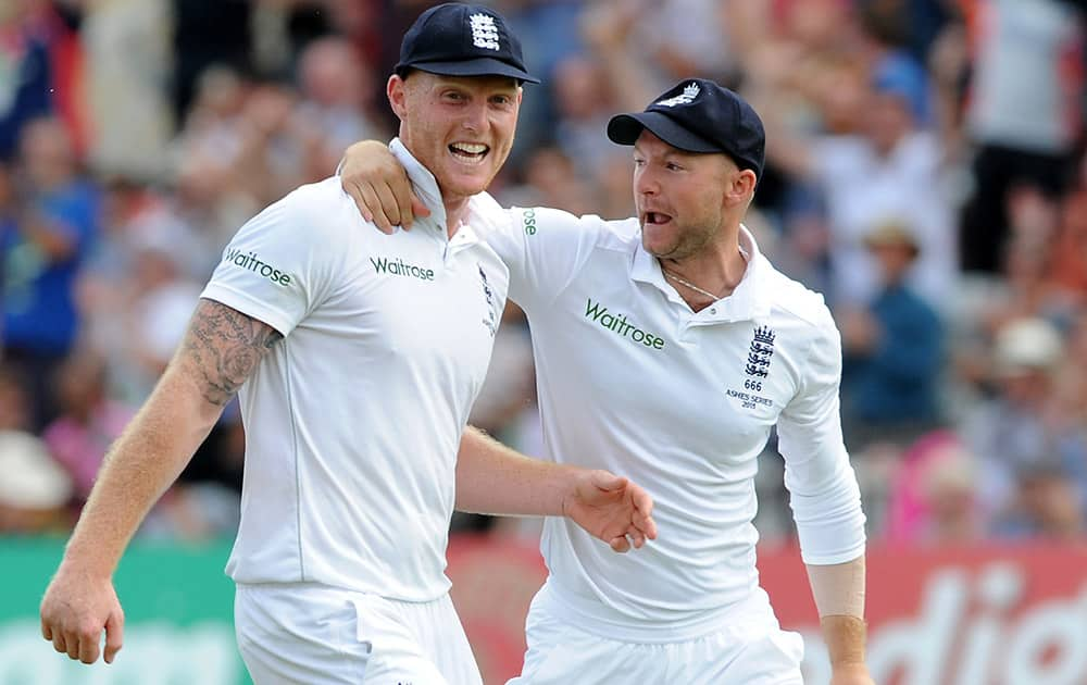 England’s Ben Stokes celebrates with Adam Lyth after catching Australia’s Steven Smith bowled by England’s Stuart Broad caught Ben Stokes for 5 runs during day two of the fourth Ashes Test cricket match, at Trent Bridge, Nottingham, England.