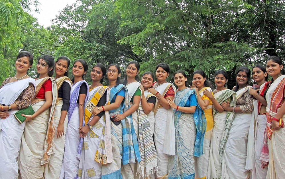 Students of Visva-Bharati University during commemoration of 74th death anniversary of Rabindranath Tagore at Santiniketan in Birbhum district of West Bengal.