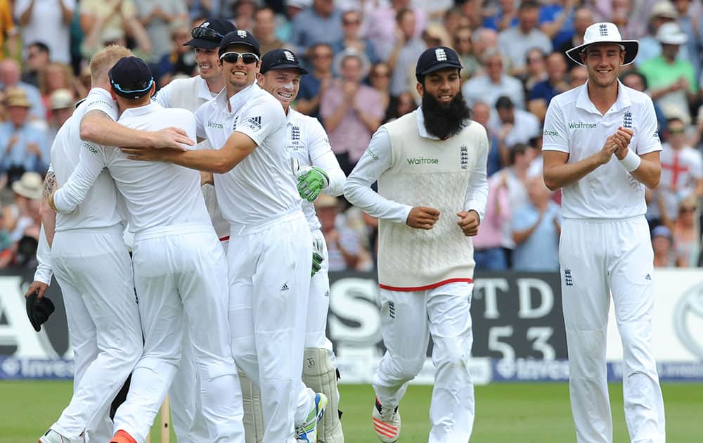 England team celebrate after England’s Ben Stokes bowled Australia’s Mitchell Starc caught England’s Ian Bell for a duck during day three of the fourth Ashes Test cricket match, at Trent Bridge, Nottingham, England.