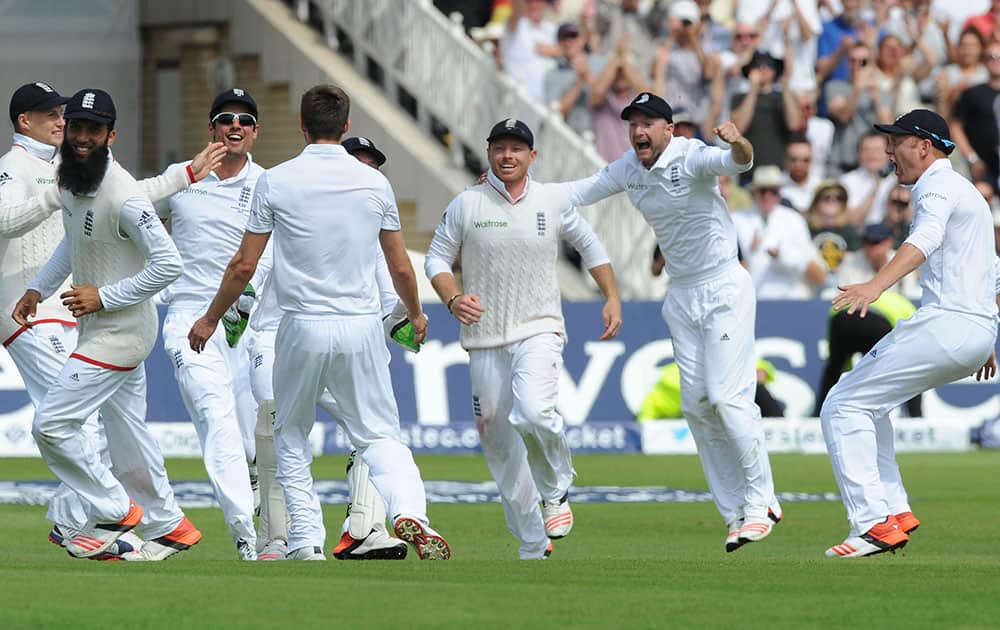 England players celebrate after England beat Australia by an innings and 78 runs to win the Ashes during day three of the fourth Ashes Test cricket match, at Trent Bridge, Nottingham, England.