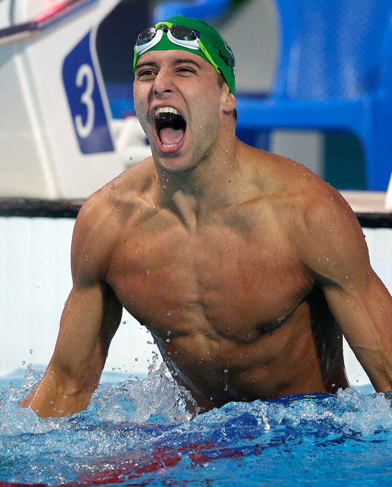 South Africas Chad Le Clos reacts after winning the mens 100m butterfly final at the Swimming World Championships in Kazan, Russia.