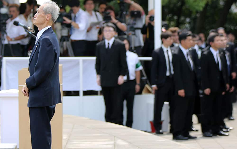 Sumiteru Taniguchi, 86, a survivor of the 1945 atomic bombing of Nagasaki, pauses before delivering his speech at the 70th anniversary of the atomic bombing in Nagasaki.