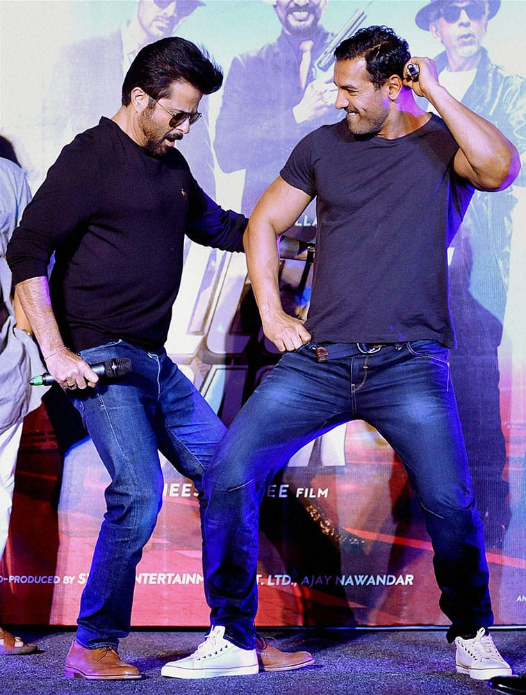 Bollywood Actors Anil Kapoor and John Abraham dance during the promotion of their upcoming Hindi film ‘Welcome Back’ directed by Anees Bazmee, in Mumbai.