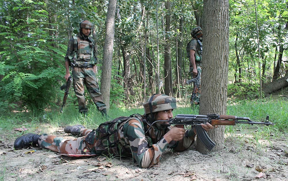 Army jawans take positions during an encounter between security forces and two suspected Lashkar-e-Toiba (LeT) militants at Peerbagh Ratnipora in south Kashmir’s Pulwama district.