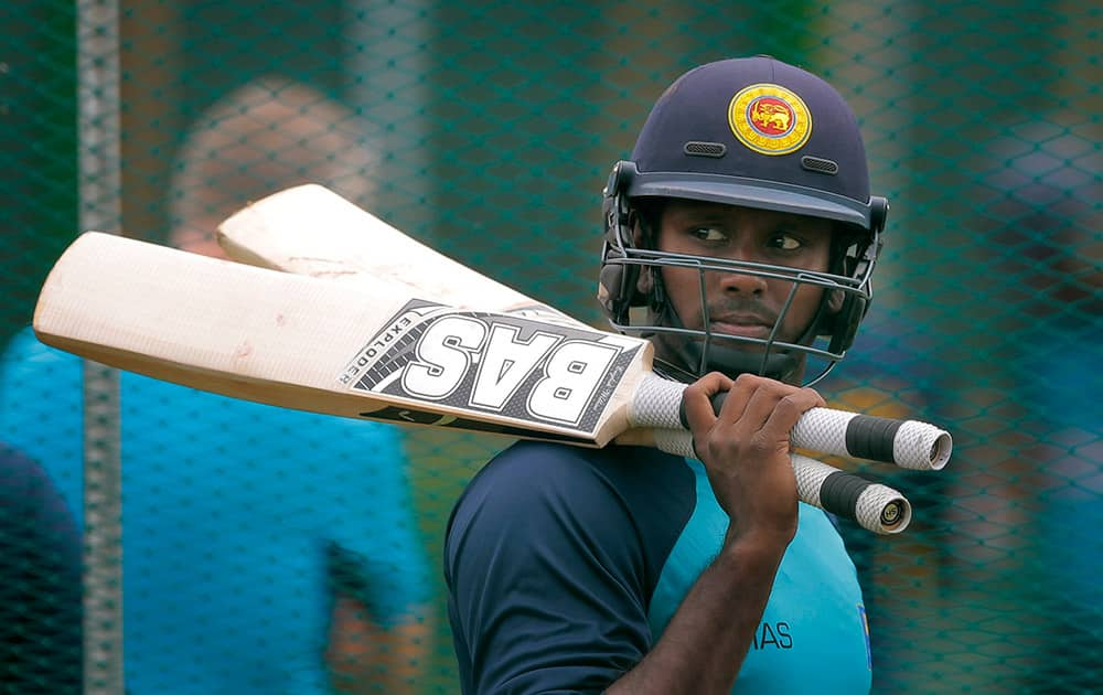 Sri Lanka's captain Angelo Mathews attends a practice session ahead of the first test cricket match against India in Galle, Sri Lanka.