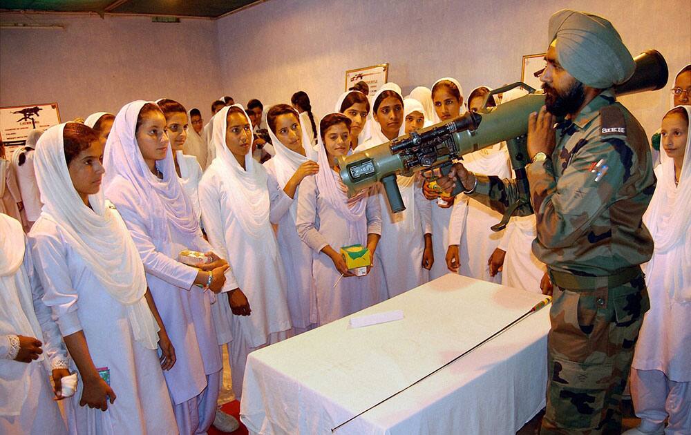 People watching various types of arms used by Indian Army during the Know your Army programme at Dilkusha Garden in Lucknow.