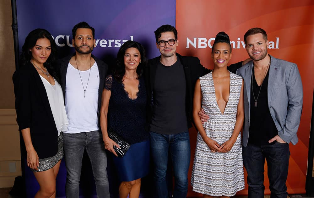 This photo provided by NBCUniversal shows, Florence Faivre, from left, Cas Anvar, Shohreh Aghdashloo, Steve Strait, Dominique Tipper, and Wes Chatham for Syfy's
