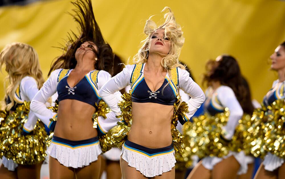 The San Diego Chargers cheerleaders perform as the Chargers play the Dallas Cowboys during the first half of an NFL preseason football game.