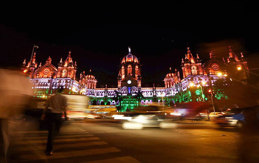 Mumbai's iconic Chhatrapati Shivaji Terminus (CST) building is illuminated in colored lights as part of India's Independence Day celebration in Mumbai.