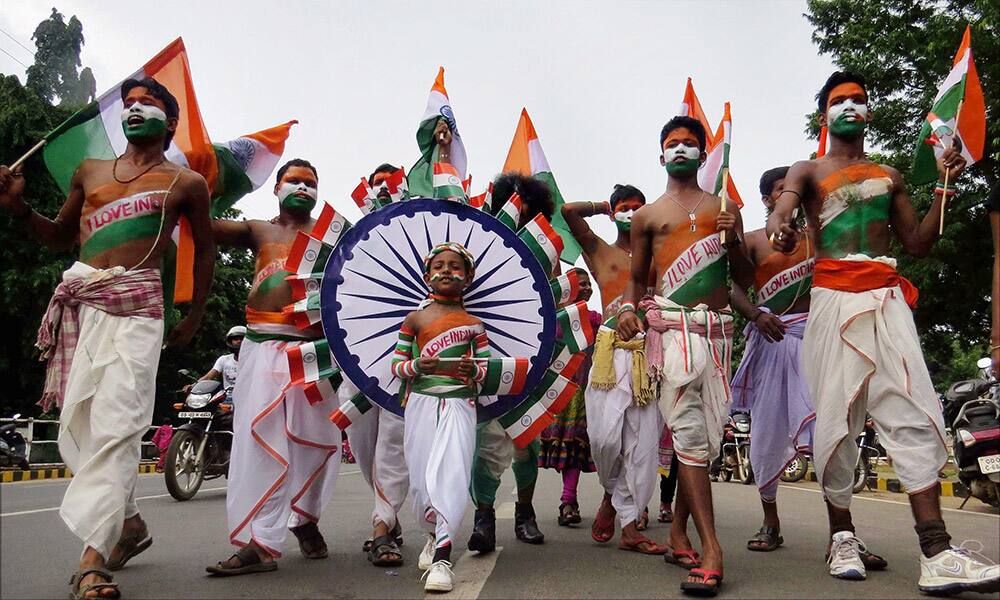 Boys take out a procession on the eve of Independence day in Bhubaneswar.