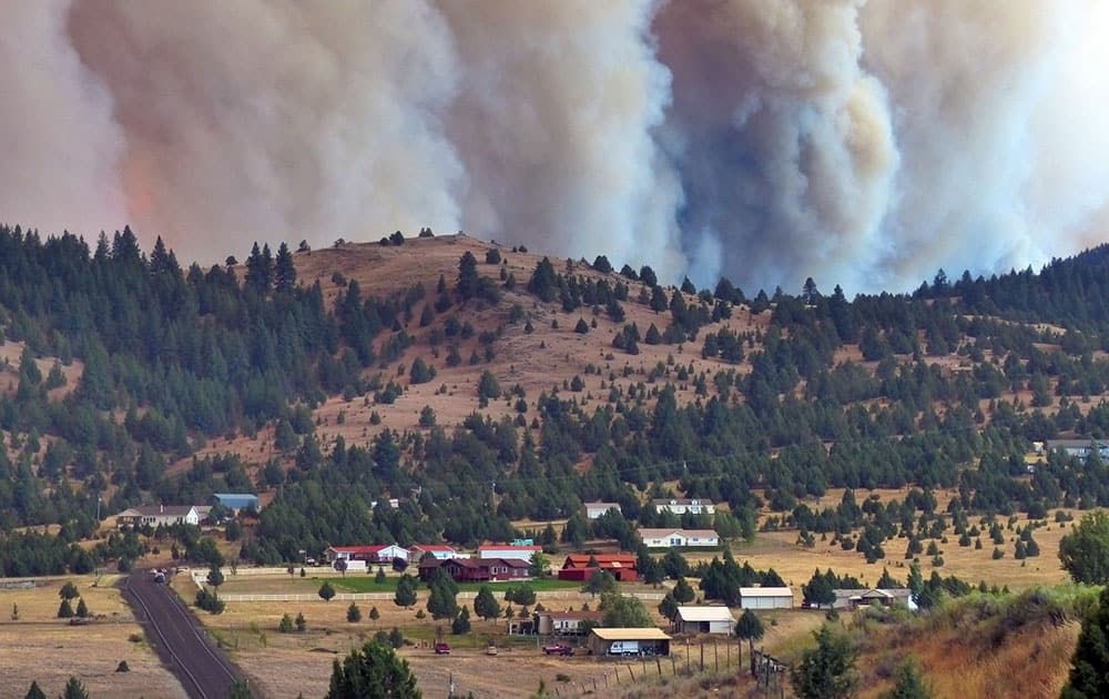 The Canyon Creek Complex fire burns towards a rural subdivision of John Day.