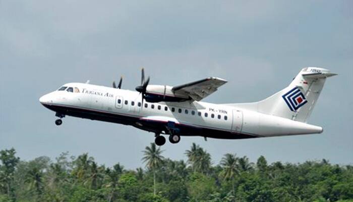 Rescue teams race to Indonesian plane crash site