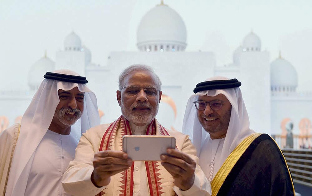 PM Narendra Modi takes a selfie with Sheikh Hamdan bin Mubarak Al Nahyan, UAE Minister of Higher Education, during his visit to the Sheikh Zayed Grand Mosque, in Abu Dhabi.