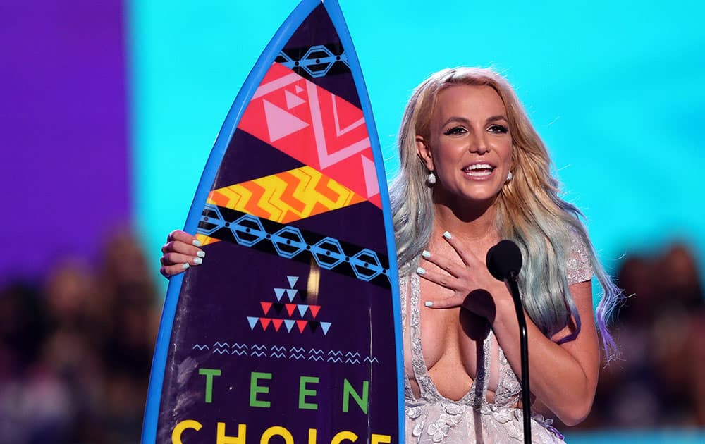 Britney Spears accepts the choice style icon award at the Teen Choice Awards at the Galen Center in Los Angeles. 