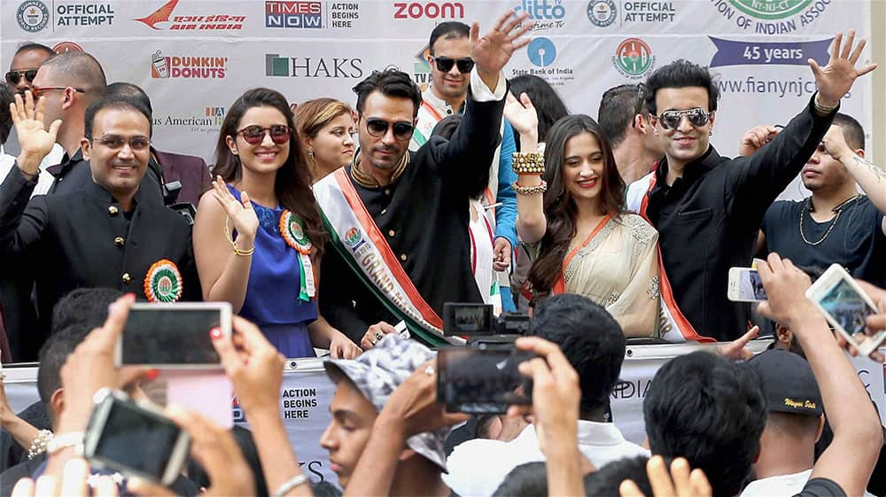 Former Indian cricketer Virender Sehwag, Bollywood actor Parineeti Chopra, Arjun Rampal and Sony TV artists Aman and Sangeeta. during 35th India day parade in New York City.