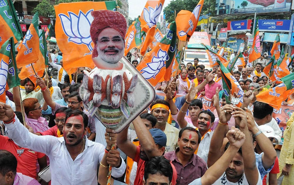 BJP workers taking out a victory rally in Patna after Prime Minister Narendra Modi announced package of Rs. 1.25 Lakh Crore for Bihar.