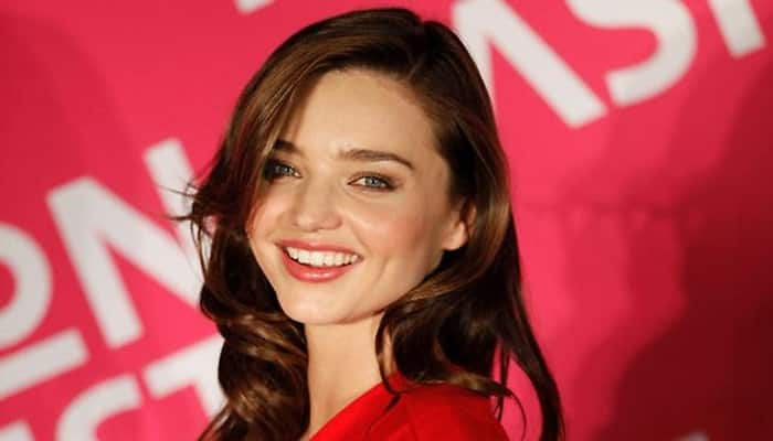 Miranda Kerr gets cosy with boyfriend Evan Spiegel