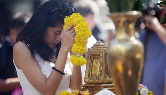 Thai police hunt bomb `network` as Bangkok shrine reopens