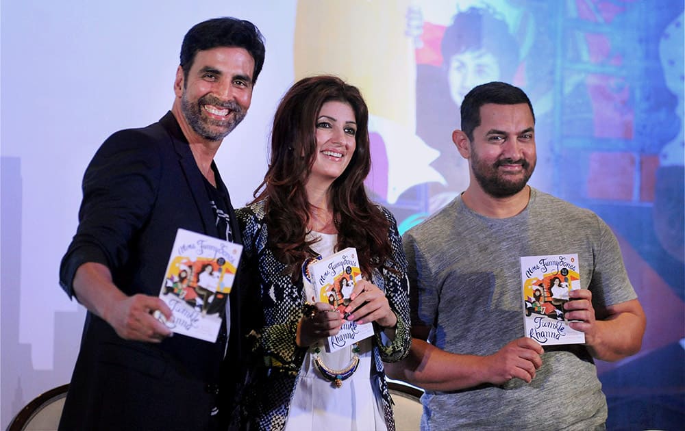 Bollywood Actors Akshay Kumar with his wife and actress, Twinkle Khanna’s and Actor Aamir Khan during the release of her Book ‘Miss Funnybonces’ in Mumbai.