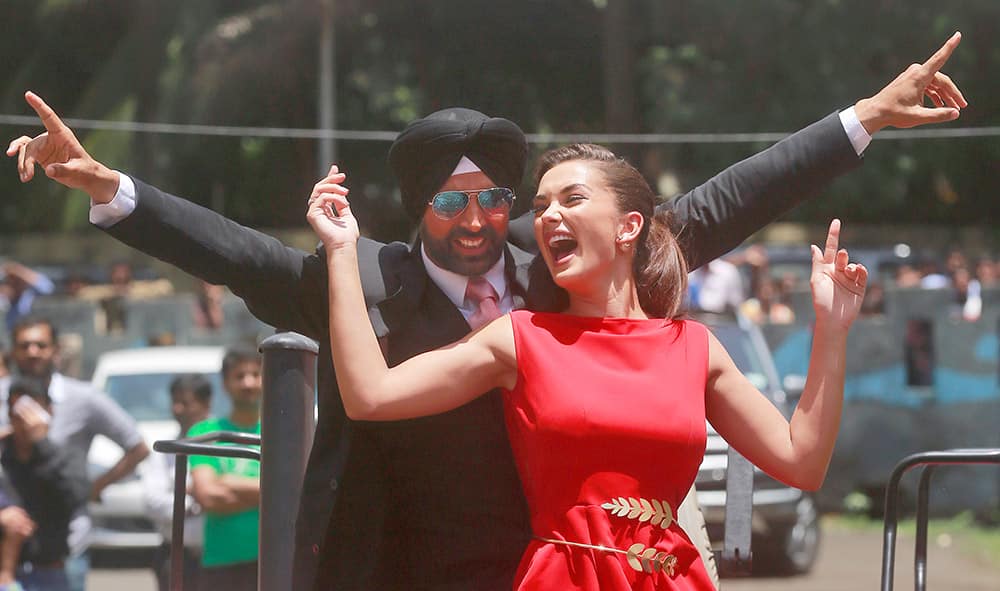 Bollywood actor Akshay Kumar and actress Amy Jackson perform during the trailer laugh of their upcoming film 'Singh is Bling' in Mumbai. The film will be released on Oct. 2.