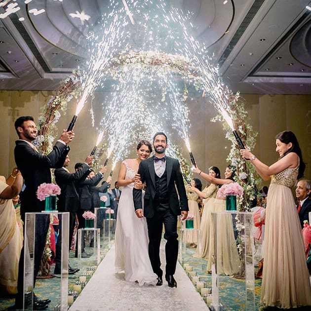 Cricketer Dinesh Karthik and ace squash player Deepika Pallikal during their wedding ceremony in Chennai.