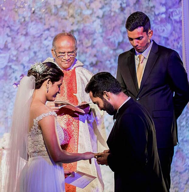 Cricketer Dinesh Karthik and ace squash player Deepika Pallikal during their wedding ceremony in Chennai.