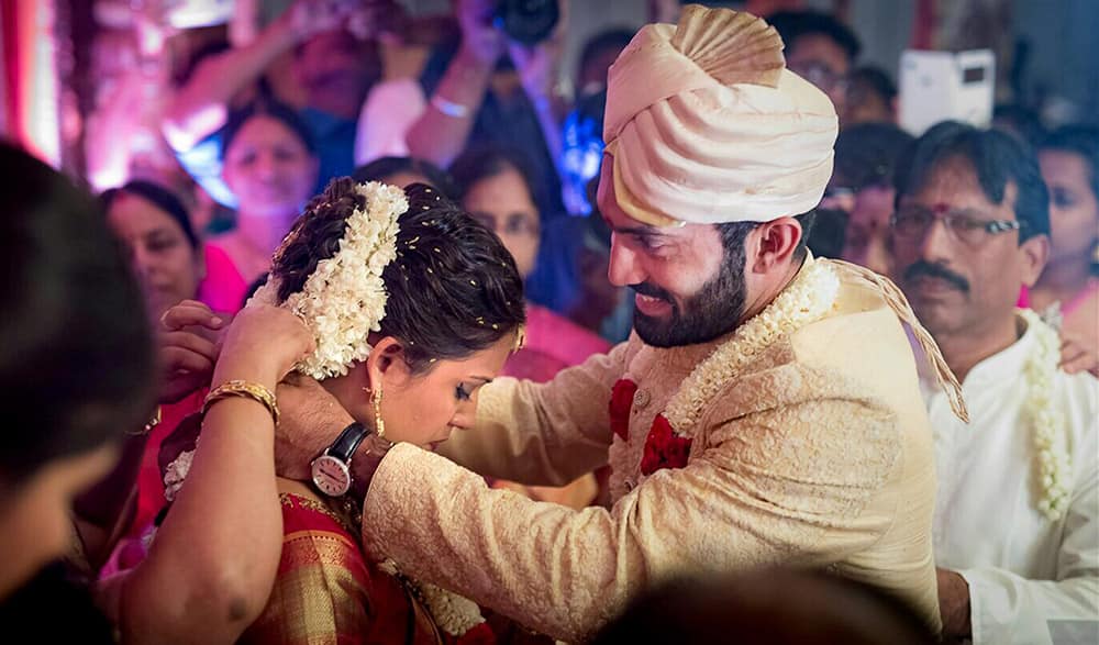 Cricketer Dinesh Karthik and ace squash player Deepika Pallikal during their wedding ceremony.