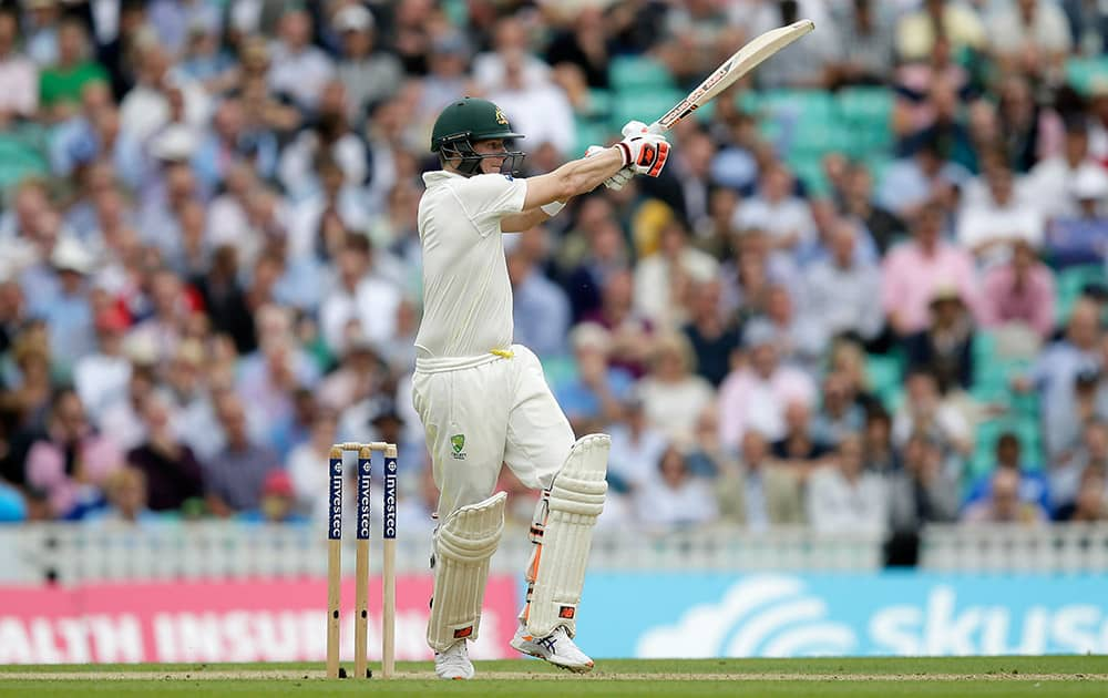 Australia's Steven Smith plays a shot off the bowling of England's Stuart Broad on the first day of the fifth Ashes Test match between England and Australia, at the Oval cricket ground in London.