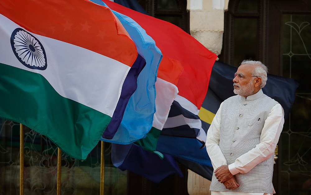 Prime Minister Narendra Modi waits for the arrival of head of states and leaders from Pacific Island countries in Jaipur.