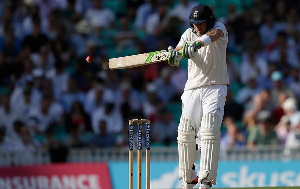 England’s Ian Bell plays a shot off the bowling of Mitchell Marsh on the second day of the fifth Ashes Test match between England and Australia, at the Oval cricket ground in London.