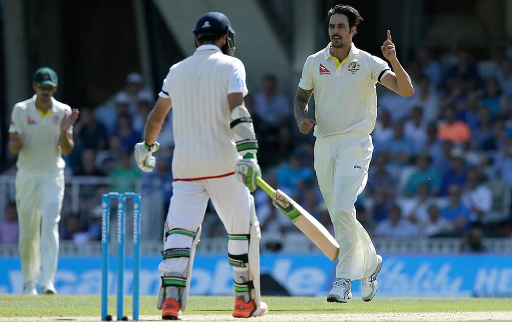 Australia’s Mitchell Johnson celebrates taking the wicket of England’s Moeen Ali on the third day of the fifth Ashes Test match between England and Australia, at the Oval cricket ground in London.