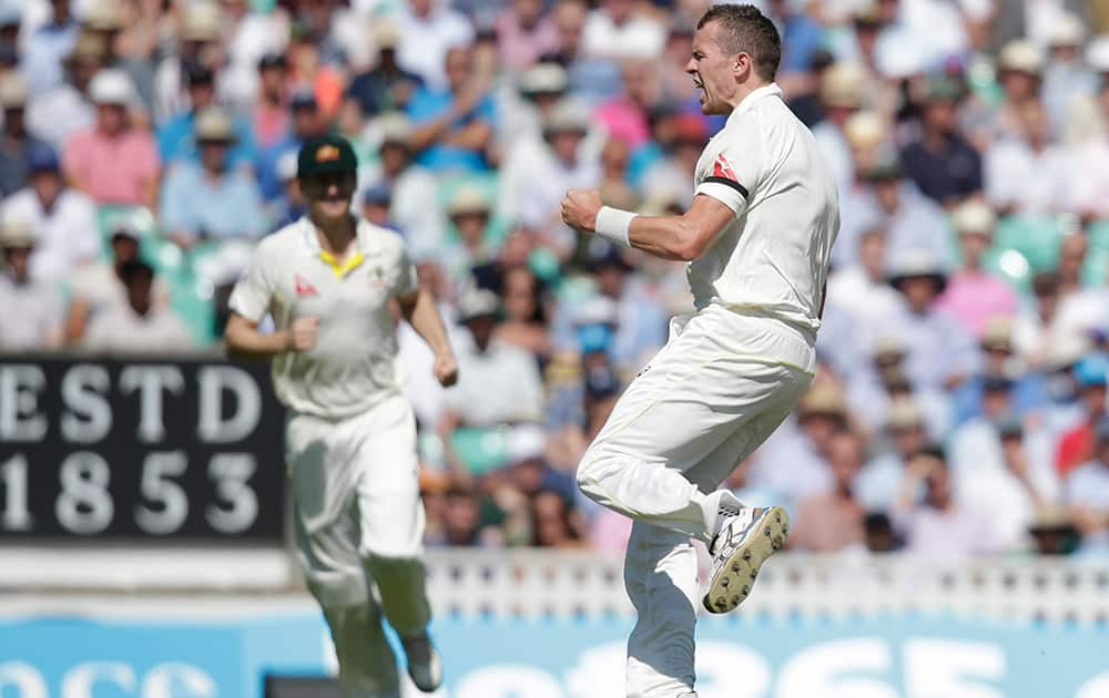 Australia’s Peter Siddle celebrates after taking the wicket of England’s Adam Lyth caught behind by teammate Australia’s Michael Clarke on the third day of the fifth Ashes cricket test between England and Australia at the Oval cricket ground in London.