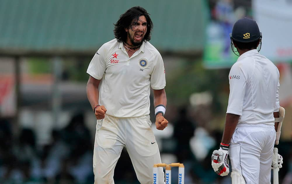 Ishant Sharma celebrates the dismissal of Sri Lanka's Lahiru Thirimanne during the third day's play of the second test cricket match between them in Colombo, Sri Lanka.