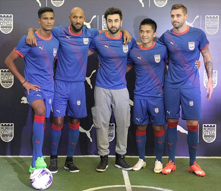 Mumbai City FC co-owner Ranbir Kapoor along with players Nicolas Anelka, Subrata Paul and Sunil Chhetri during the launch of the new kit for the team in Mumbai.