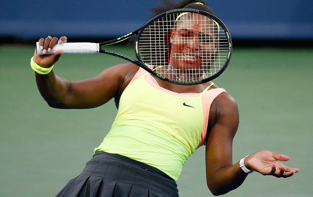 Serena Williams, of the United States, follows through on a shot to Elina Svitolina, of Ukraine, during a semifinal at the Western & Southern Open tennis tournament.