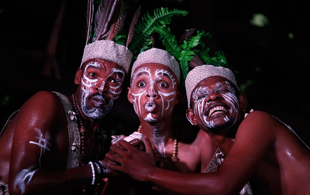 Folk dancers perform Siddi Dhamal, a unique dance form of the Siddi community of India's western state of Gujarat, during an art and cultural festival in Ahmadabad, India.