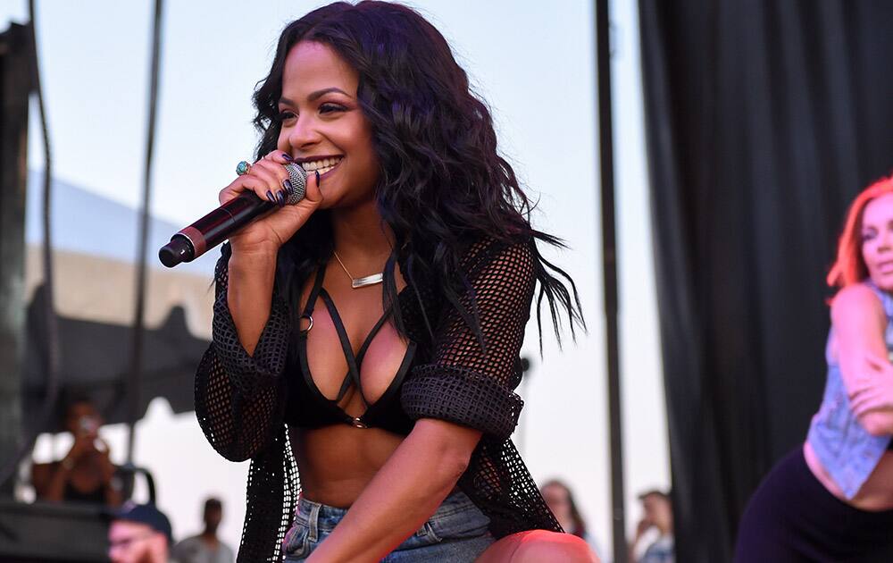 Singer Christina Milian performs at the 2015 Billboard Hot 100 Music Festival at Nikon at Jones Beach Theater in Wantagh, N.Y.