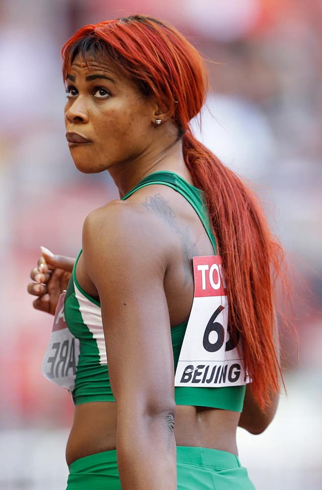 Nigeria's Blessing Okagbare looks up after finishing women's round one 100m at the World Athletics Championships at the Bird's Nest stadium in Beijing.