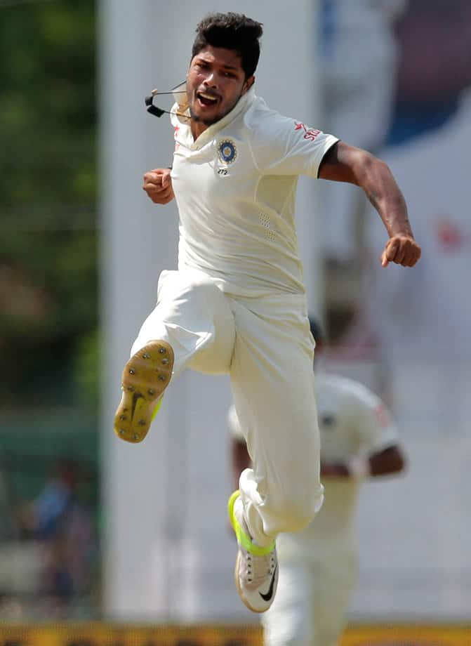 India's Umesh Yadav celebrates after taking the wicket of Sri Lanka's captain Angelo Mathews during the fifth day of the second test cricket match between Sri Lanka and India in Colombo, Sri Lanka.